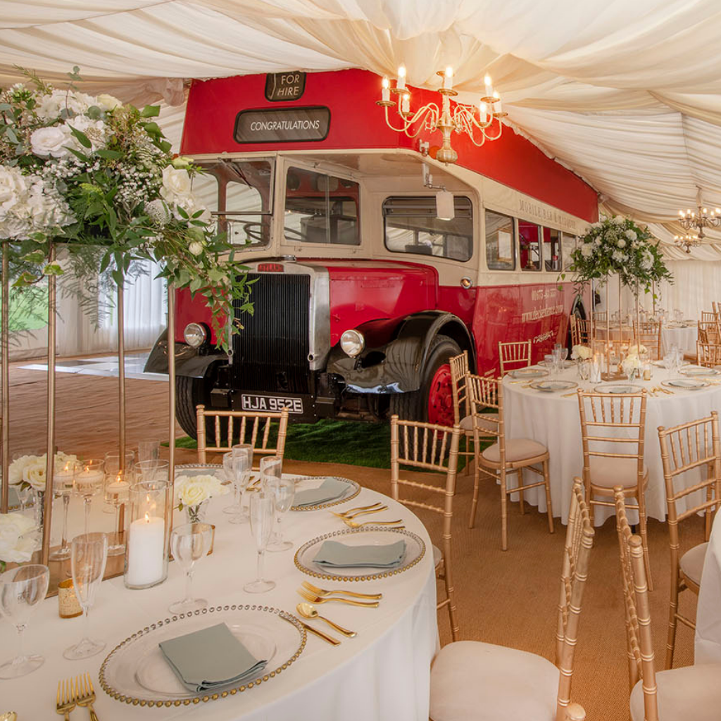 Deckerdence wedding venue with traditional white floral on banquet tables for traditional wedding vibe